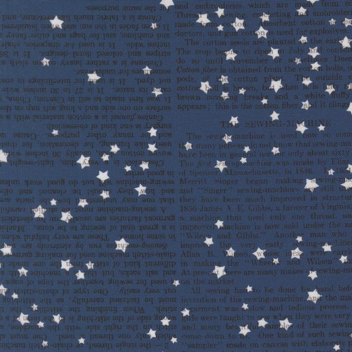 Fabric with star pattern and text on a blue background