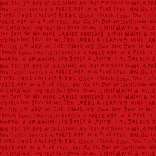 Red fabric with printed Christmas song text