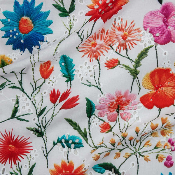 Digitally printed eyelet fabric with colorful floral pattern