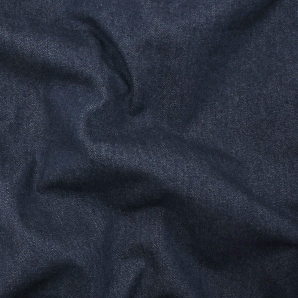 Close-up of dark blue fabric with a textured pattern