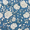 White floral pattern on a blue background