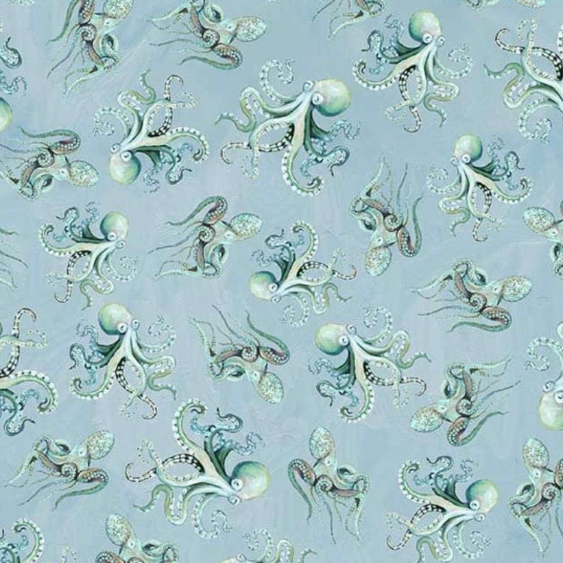 Pattern of green octopuses on a light blue background