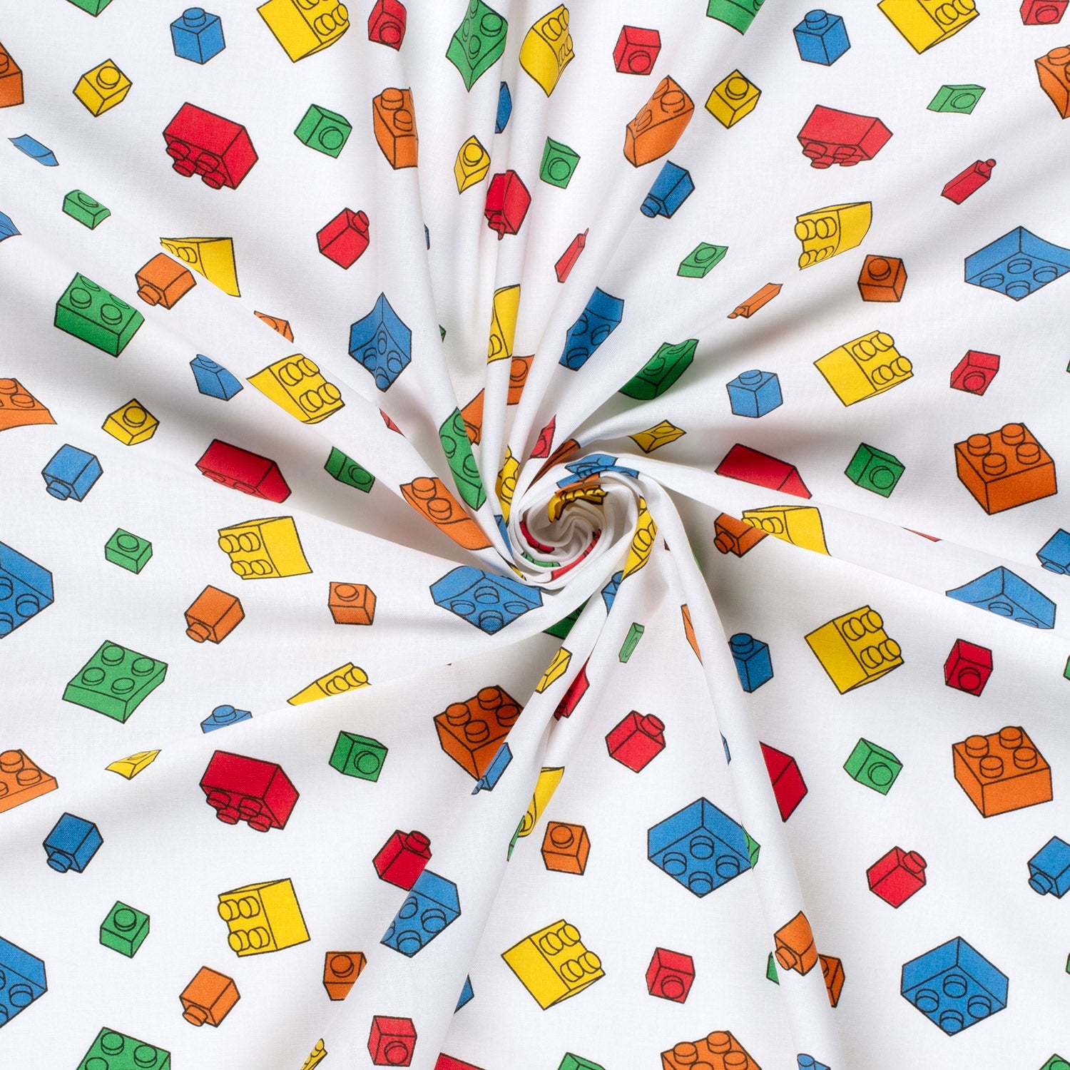Roll of fabric with colorful Lego block pattern on a white background