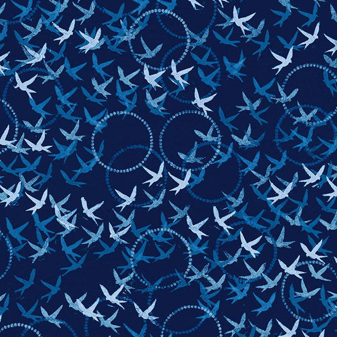 Pattern of birds and circles on a blue background