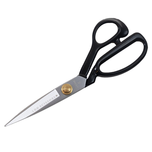 Pair of scissors with black handles on a white background