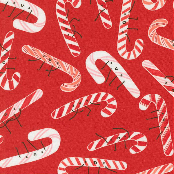 Pattern of candy canes on a red background